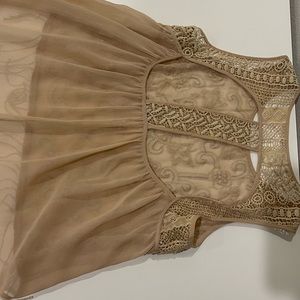 Cute shear top with lots of beading